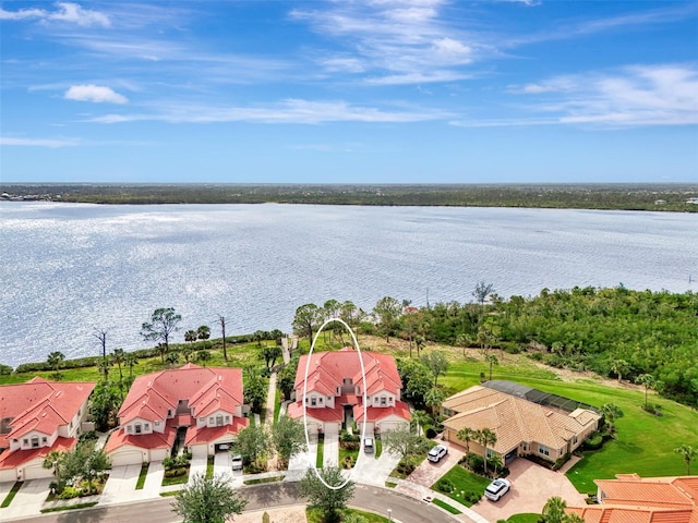 bird's eye view with a water view