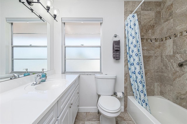 full bathroom with vanity, tile patterned floors, shower / bath combo with shower curtain, and toilet