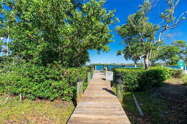 dock area featuring a water view