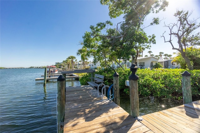 dock area featuring a water view