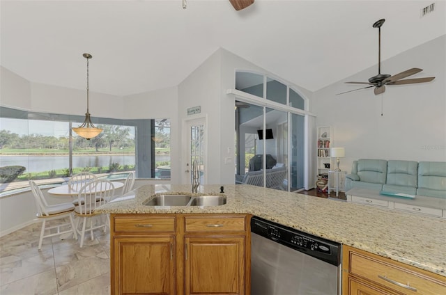 kitchen with lofted ceiling, sink, a water view, stainless steel dishwasher, and ceiling fan