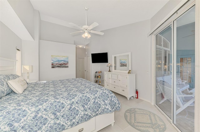 tiled bedroom with access to outside and ceiling fan