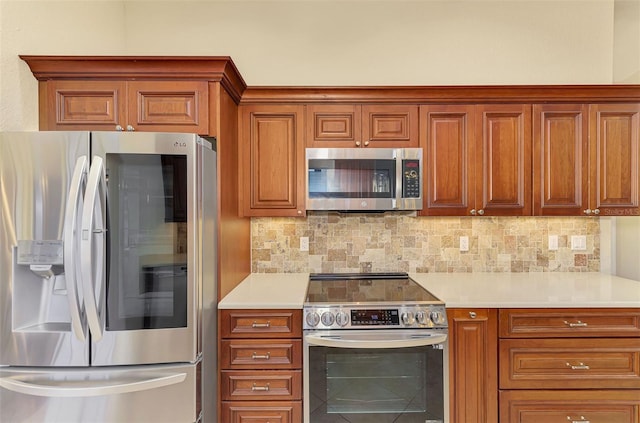 kitchen with stainless steel appliances, brown cabinetry, light countertops, and decorative backsplash