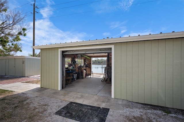 garage featuring a water view