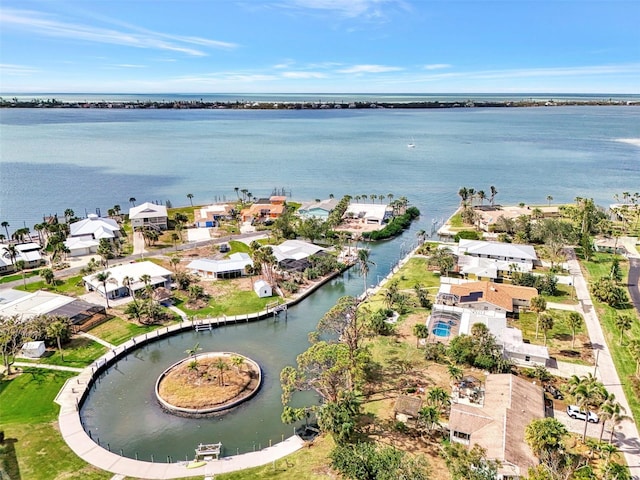 aerial view with a water view and a residential view