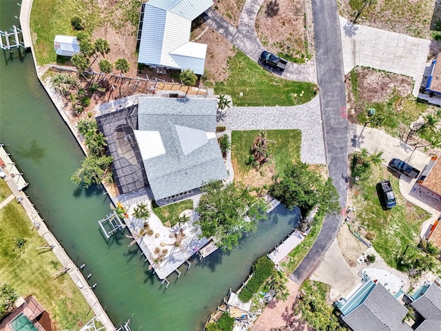 drone / aerial view featuring a water view