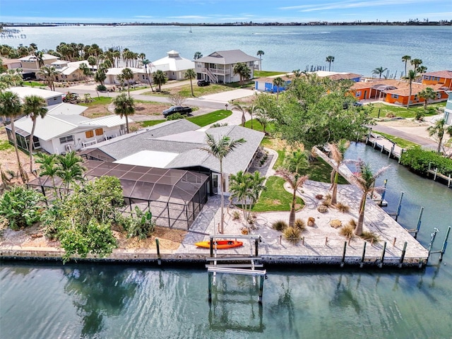 aerial view featuring a water view and a residential view