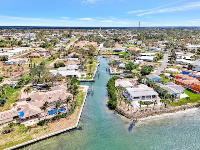 birds eye view of property featuring a residential view and a water view