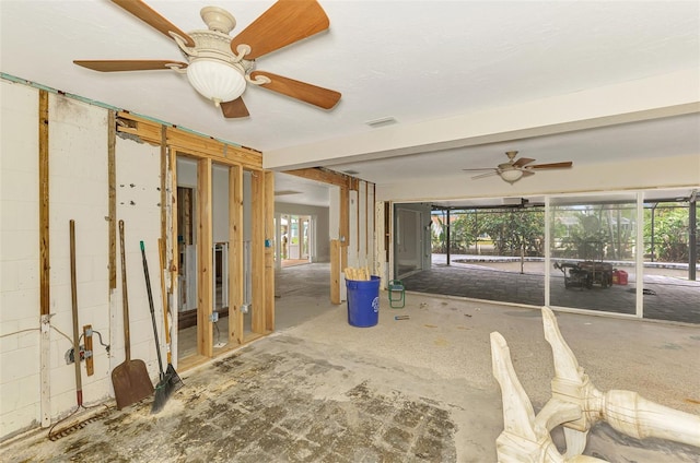 interior space featuring a ceiling fan, a healthy amount of sunlight, and visible vents