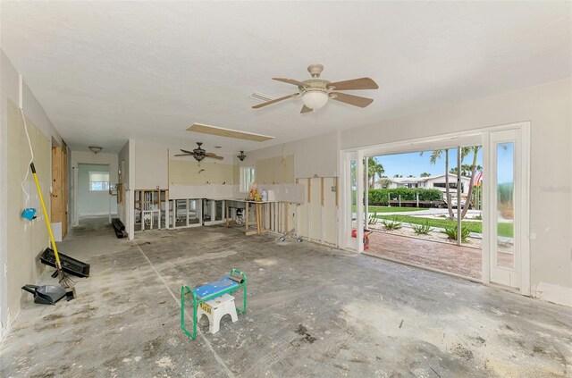 interior space featuring a ceiling fan