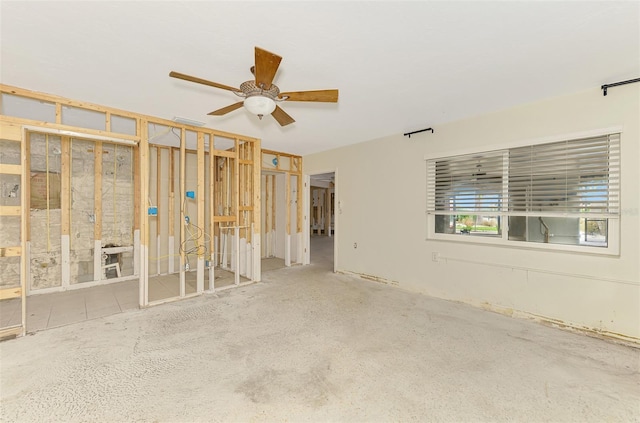 empty room featuring ceiling fan