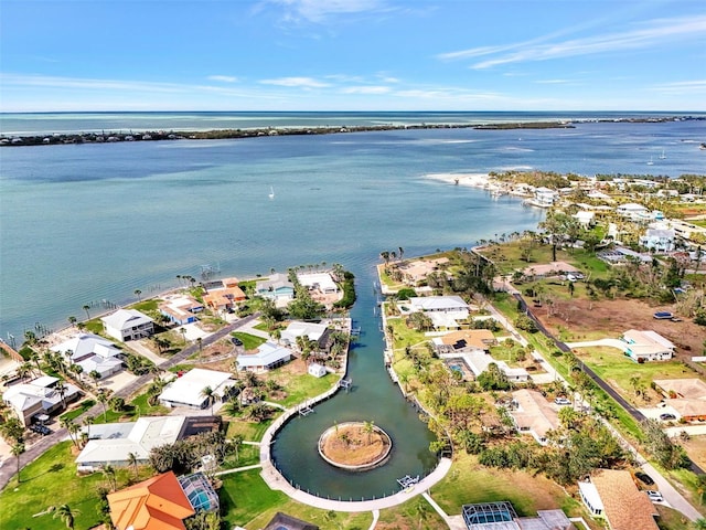 birds eye view of property featuring a residential view and a water view