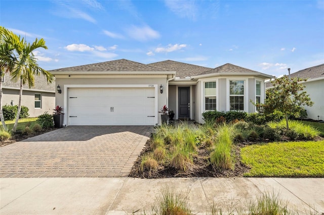 view of front of property featuring a garage