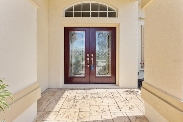 doorway to property featuring french doors