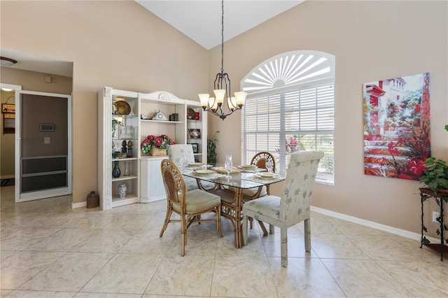 dining space featuring a notable chandelier, high vaulted ceiling, and light tile patterned flooring