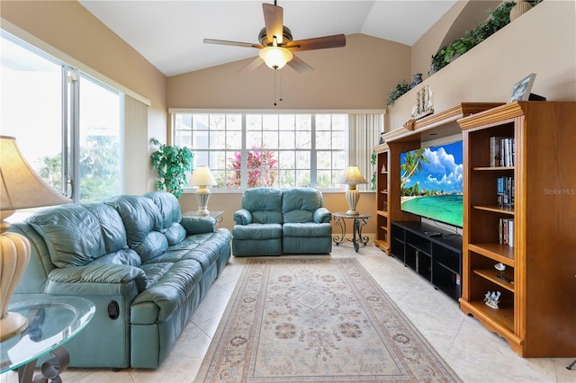 living room featuring lofted ceiling, light tile patterned floors, and ceiling fan