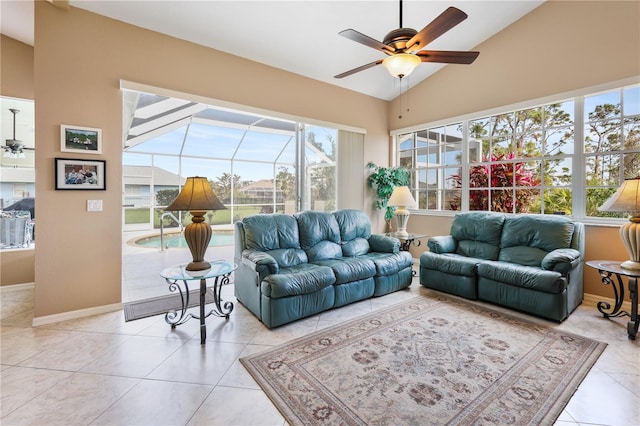 tiled living room with vaulted ceiling and ceiling fan