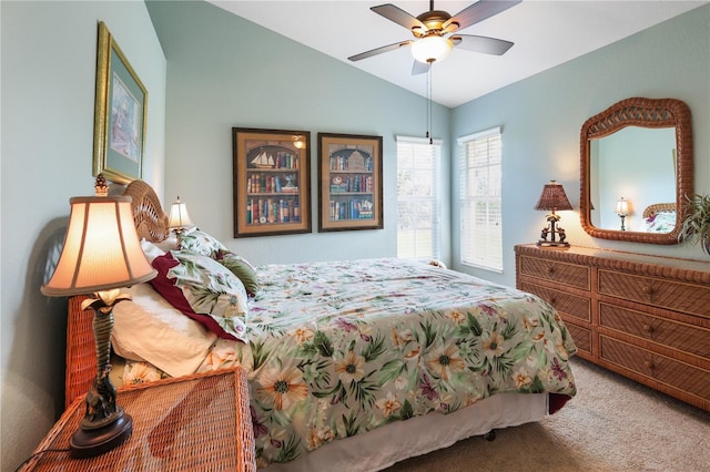 bedroom with vaulted ceiling, carpet, and ceiling fan