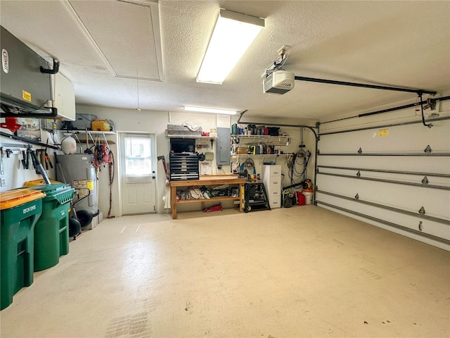 garage featuring a garage door opener and water heater