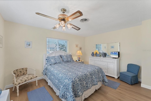 bedroom featuring ceiling fan and light wood-type flooring