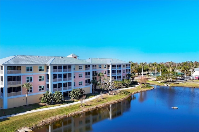 view of building exterior featuring a water view