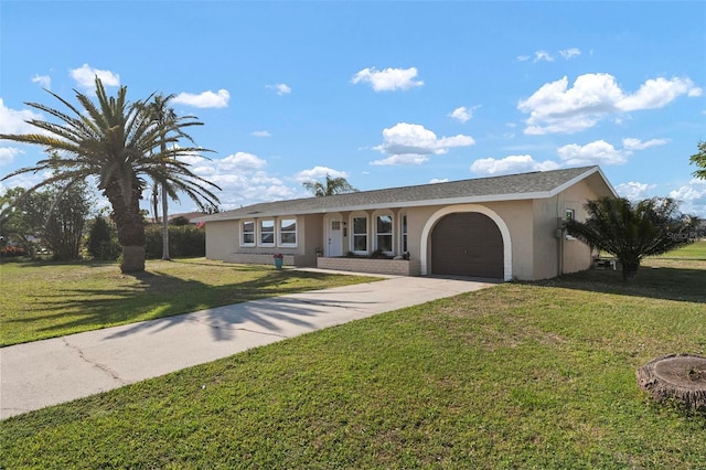 single story home featuring a garage and a front yard