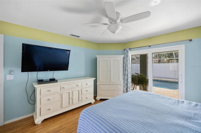 bedroom with access to outside, ceiling fan, and light hardwood / wood-style flooring