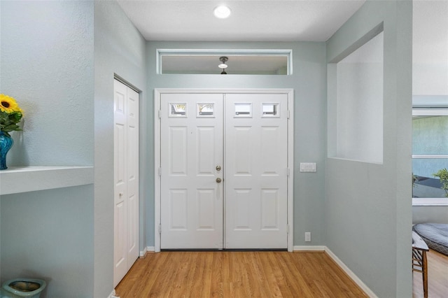 entryway with light wood-type flooring