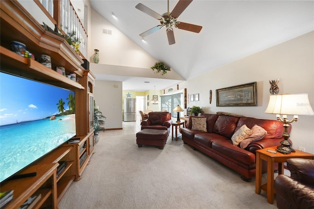 living room featuring light carpet, high vaulted ceiling, and ceiling fan