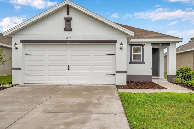 single story home featuring an attached garage, driveway, roof with shingles, and stucco siding