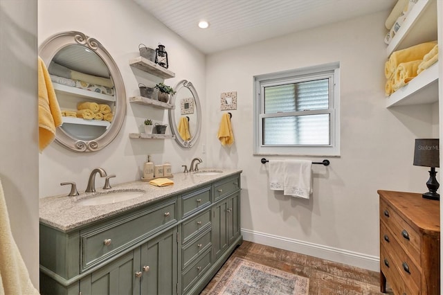 bathroom featuring hardwood / wood-style flooring and vanity