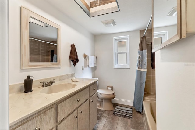 full bathroom with vanity, toilet, and shower / bath combo