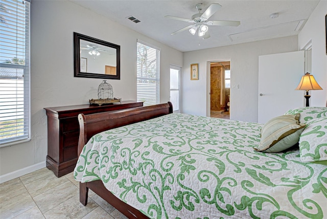 bedroom with light tile patterned flooring and ceiling fan