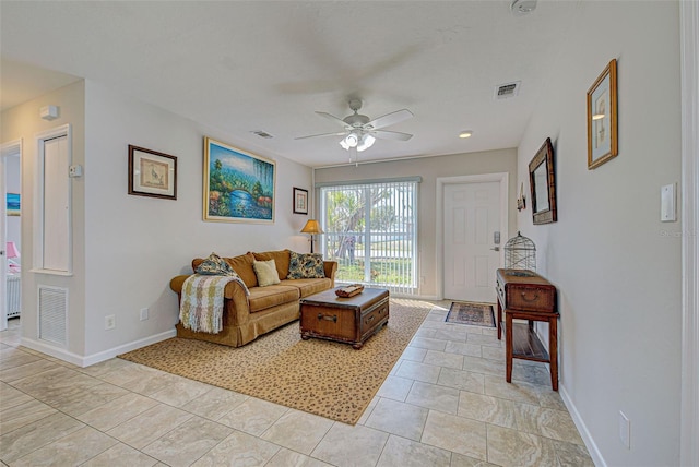 living room featuring ceiling fan