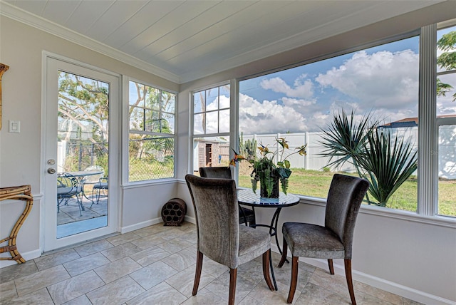 sunroom / solarium featuring a wealth of natural light