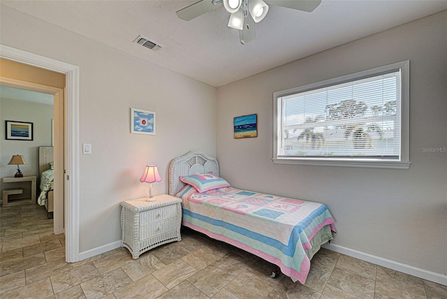 bedroom featuring ceiling fan