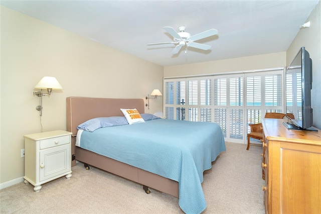 carpeted bedroom with multiple windows