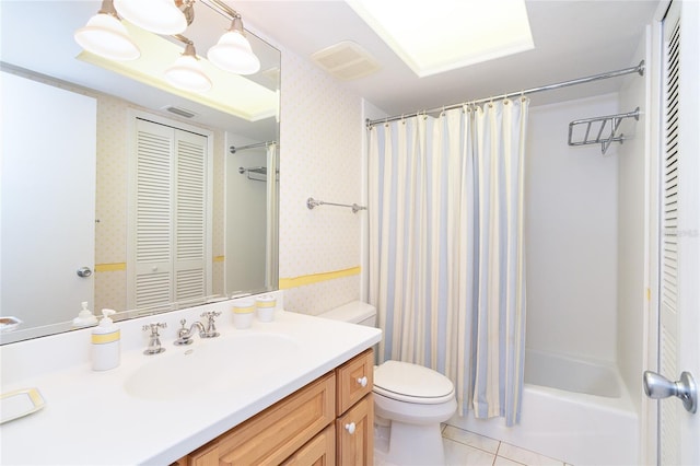 full bathroom with shower / bath combination with curtain, tile patterned floors, toilet, and vanity