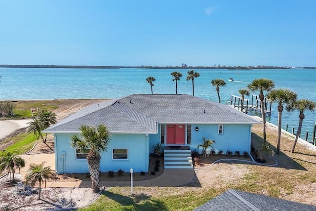 ranch-style house with a water view