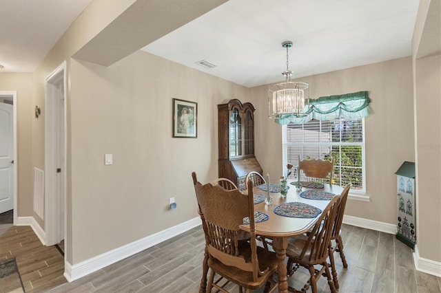 dining room featuring an inviting chandelier