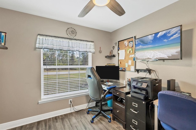 office area with wood-type flooring and ceiling fan