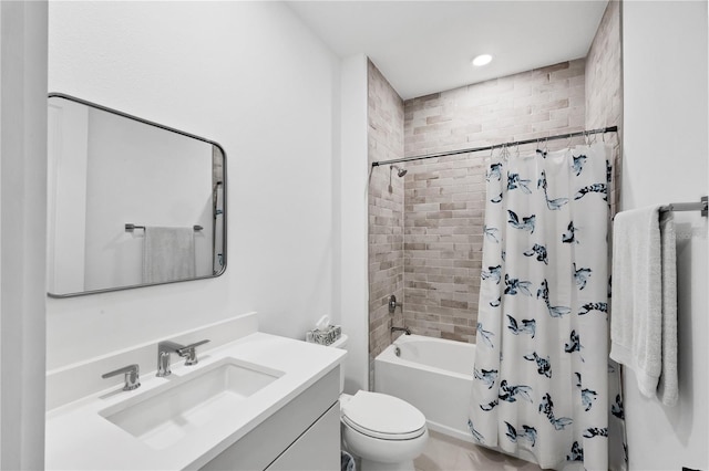 full bathroom featuring vanity, toilet, and shower / bath combo