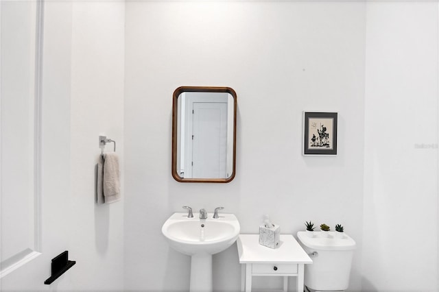 bathroom featuring toilet