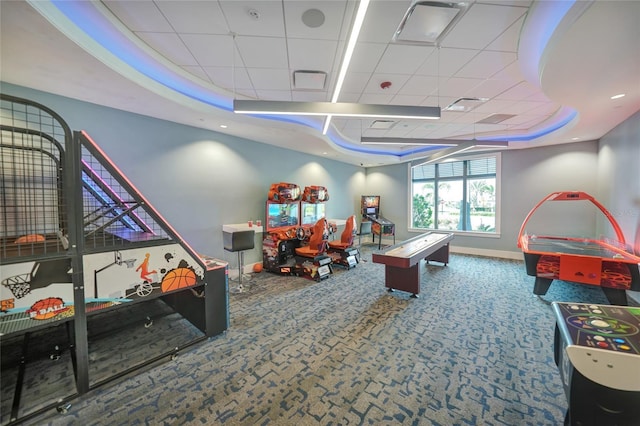 6237 Fish Eagle Ct, Nokomis, FL 34275 - game room featuring a raised ceiling and carpet flooring