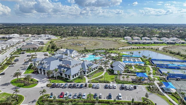 6237 Fish Eagle Ct, Nokomis, FL 34275 - aerial perspective of suburban area with a nearby body of water and a pool area