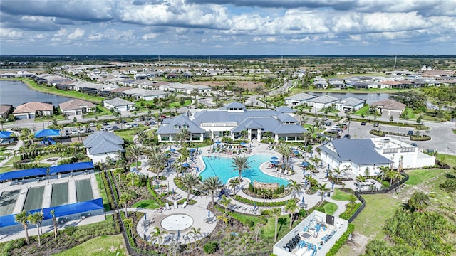 6237 Fish Eagle Ct, Nokomis, FL 34275 - aerial perspective of suburban area featuring a pool and a large body of water
