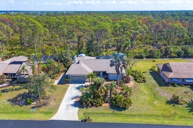 aerial view featuring a view of trees