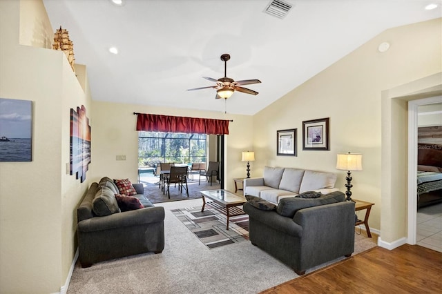 living area featuring a ceiling fan, recessed lighting, baseboards, visible vents, and wood finished floors