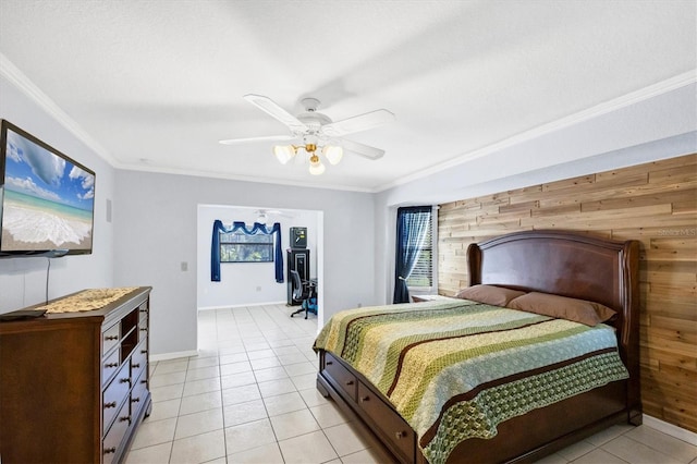 bedroom with ornamental molding, wooden walls, light tile patterned flooring, and a ceiling fan