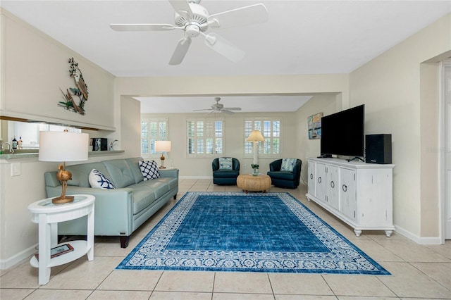 tiled living room featuring ceiling fan